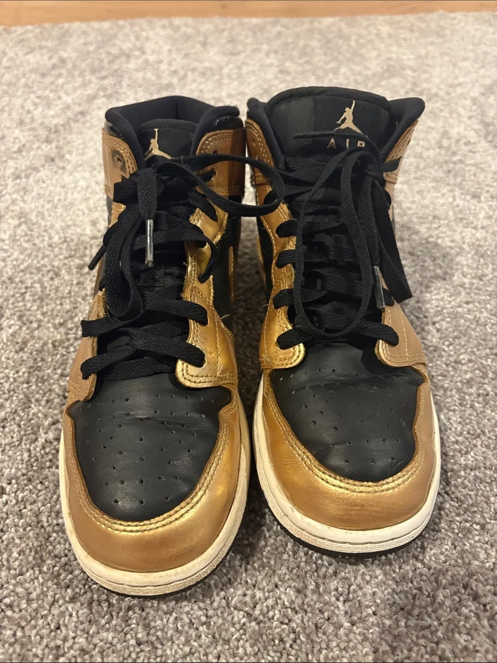Nike Mid-Top Sneakers in Black and Gold